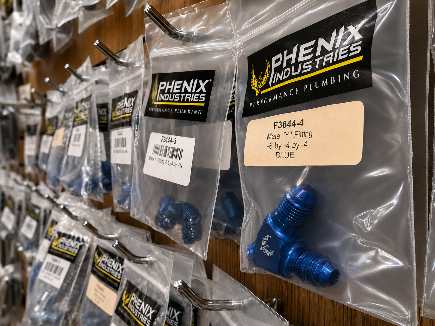 Phenix AN fittings and performance plumbing parts on display at Restoration Rods